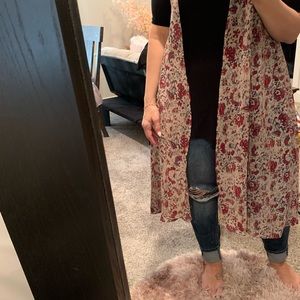 Long floral vest great with jeans or dress